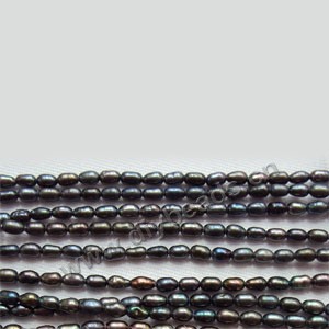 Pearl, cultured freshwater (dyed),blue peacock,5-6mm rice AAA grade. Sold per 16-inch(40cm) strand