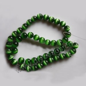 Bead, cat's eye glass,green, 8mm round, quality grade. Sold per 14.5-inch strand.