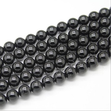 Bead, black tourmaline 3A  (natural), 4mm round. Sold per 16-inch strand