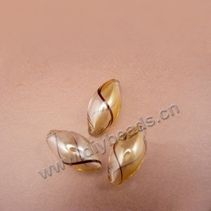 Bead, hand-blown glass, amber/brown, 24x14mm hollow oval. Sold per pkg of 10