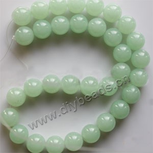 Bead, light green "jade" (dyed), 12mm round. Sold per 15-inch strand,approximately 33 beads .