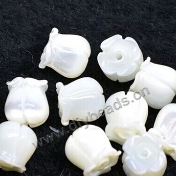 Bead,freshwater shell ( natural ),white,7mm ,flower.Sold per pkg of 20pcs.