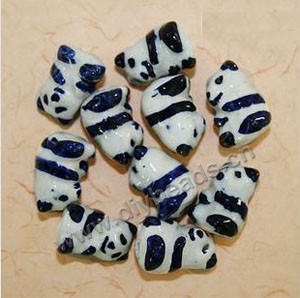 Bead, porcelain, blue/white, 19x12mm panda. Sold per pkg of 30 beads. 