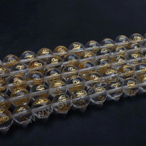 Bead,clear quartz crystal,10mm round with hot stamping om mani padme hum prayer beads. Sold per 16-inch strand