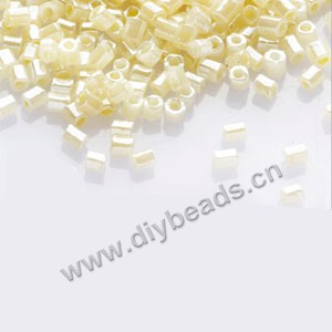 Bugle bead,taiwan, glass, silky luster,light yellow ,#1(2x2mm) hex beads. Sold per pkg of 500 grams,approximately 40,000ps
