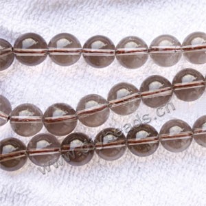 Bead, smoky quartz (heated/irradiated), 12mm round. Sold per 15-inch strand