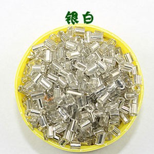 Bugle bead, glass,silver-lined,silver ,#1(2x2mm) beads. Sold per pkg of 80 grams,approximately 4,500ps.