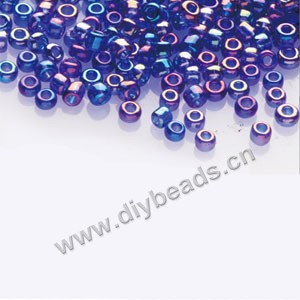 #11 seed beads,glass,cobalt blue,rainbow,irregular round.sold per pkg of 1/2 kilo.