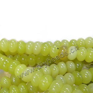 Bead, lemon "jade" (natural), 8x5mm rondelle. Sold per pkg of ten 16-inch strands.