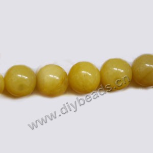 Bead, yellow "jade" (natural), 12mm round. Sold per 15-inch strand