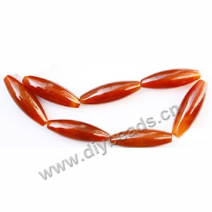 Bead, red agate (dyed), 10x30mm oval. Sold per 15-inch strand.