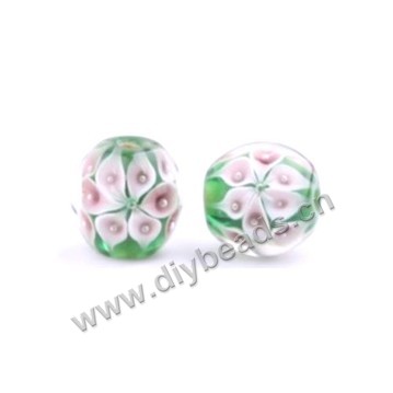 Bead, lampworked glass,green with flower, 16x16mm round.mini order 50pc 