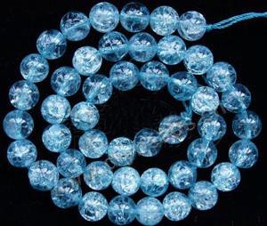 Bead, ice flake quartz (heated/dyed), blue, 6mm round. Sold per 16-inch strand