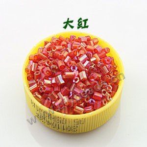 Bugle bead, glass,rainbow ,red ,#1(2x2mm) beads. Sold per pkg of 80 grams,approximately 4,500ps.
