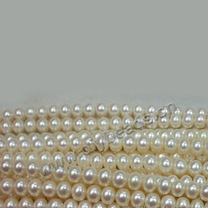 Pearl, cultured freshwater (dyed),peach, 6-7mm button. Sold per 14.8-inch(37cm) strand
