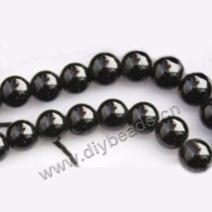 Bead, black tourmaline (natural), 10mm round. Sold per 16-inch strand