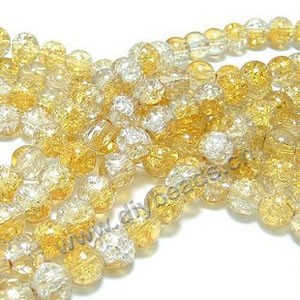 Bead, crackle glass, clear and yellow, 8mm round. Sold per 32-inch strand, approximately 100ps/strand