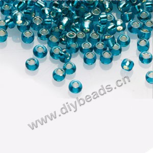 #11 seed beads,glass,aqua,silver-lined,irregular round.sold per pkg of 1/2 kilo.