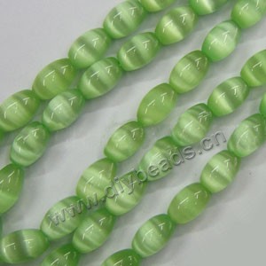Bead, cat's eye glass,light green ,9x6mm oval. Sold per 15-inch strand.