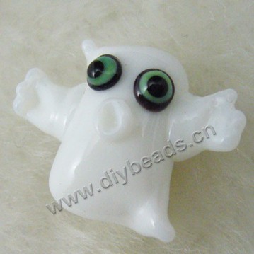 Bead, lampworked glass, opaque white and black, 22x17mm ghost. Sold per pkg of 4.