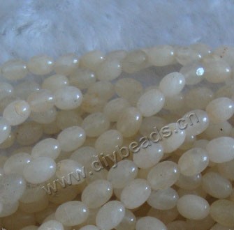 Bead, yellow aventurine (natural), 7x9mm barrel. Sold per 16-inch strand