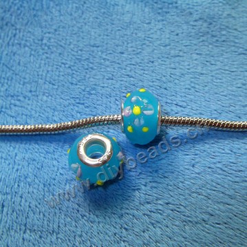 beads,glass,large hole beads light blue, 10x14mm. Sold per pkg of 100ps