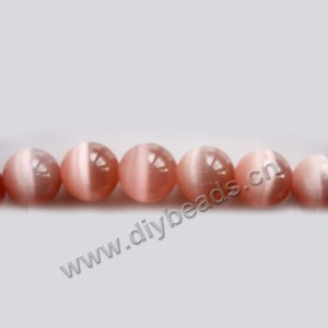 Bead, cat's eye glass,pink, 10mm round, quality grade. Sold per 14.5-inch strand.