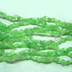 Bead, cat's eye glass, green, chip. Sold per 32-inch strand.