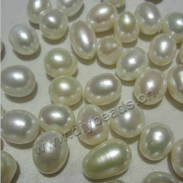   Pearl  rice shape pearl , Agrade , colorful cultured freshwater,   10--11mm. Sold by pc