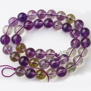 Bead, ametrine (imitation), 10mm  round,sold per 15-inch strand,approximately  40ps.