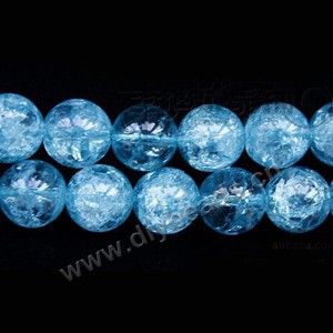 Bead, ice flake quartz (heated/dyed), blue, 12mm round. Sold per 16-inch strand