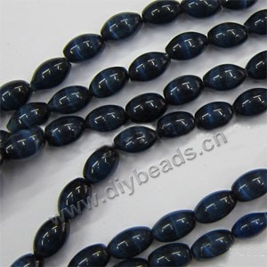 Bead, cat's eye glass,blue ,9x6mm oval. Sold per 15-inch strand.