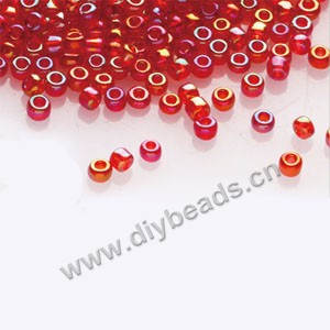 #11 seed beads,glass,dark red,rainbow,irregular round.sold per pkg of 1/2 kilo.