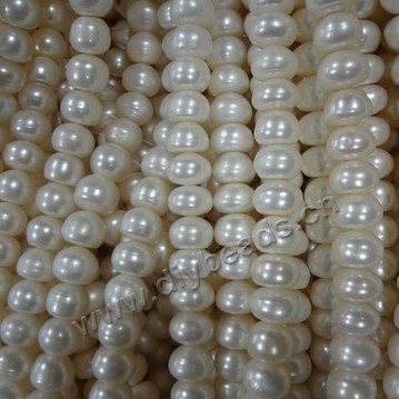 Pearl, cultured freshwater,white ,11-12mm button, A grade. Sold per bag of one strand