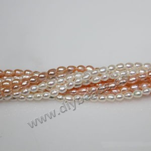 Pearl,cultured freshwater (natural), white/peach/mauve, 2-3mm rice, B+ grade. Sold per pkg of (3)16-inch strands.