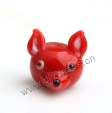 Bead,lampworked glass,red fox head, 15*19mm. Sold per pkg of 5.