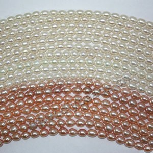 Pearl,cultured freshwater (natural), white/peach/mauve, 5-6mm rice, B grade. Sold per pkg of (10)16-inch strands.