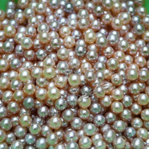 Pearl, peach/mauve, 4-5mm half-drilled round, AAA grade. Sold per pkg of 4pairs