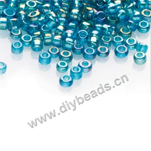 #11 seed beads,glass,aqua,rainbow,irregular round.sold per pkg of 1/2 kilo.