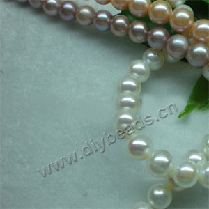 Pearl, cultured freshwater (natural),apricot/satin sand/white, 7-8mm nearly round. Sold per 14.8-inch(37cm) strand