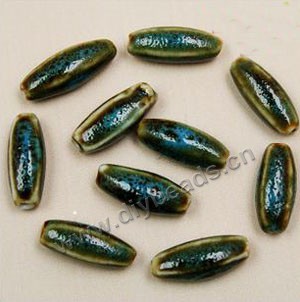 Bead , fancy glaze porcelain,blue, 18x7mm long oval. Sold per pkg of 30 beads. 