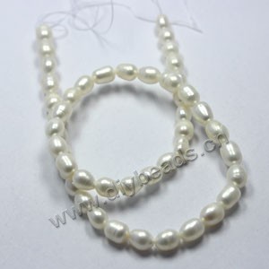 Pearl, cultured freshwater (natural), white, 6-7mm rice,B grade. Sold per 15-inch strand