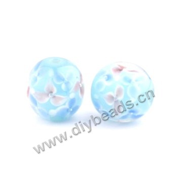 Bead, lampworked glass,blue with flower, 16x16mm round.mini order 50pc 