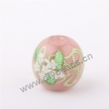 Bead, lampworked glass,pink with flower, 14x14mm round.mini order 50pc 