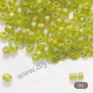 Seed bead,glass,rainbow matte,lime green,#11 irregular round. Sold per pkg of 1/2 kilo. 