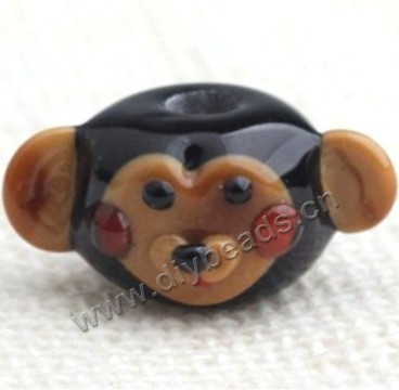 Bead,lampworked glass,black monkey head, 23*11mm rondelle with monkey. Sold per pkg of 5.