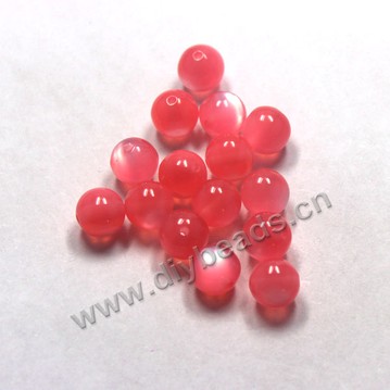 Bead, acrylic, cat's eye peaches, 10mm round. Sold per pkg of 100ps