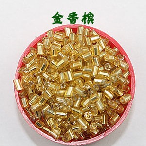 Bugle bead, glass,silver-lined,light gold ,#1 (2x2mm)beads. Sold per pkg of 80 grams,approximately 4,500ps.