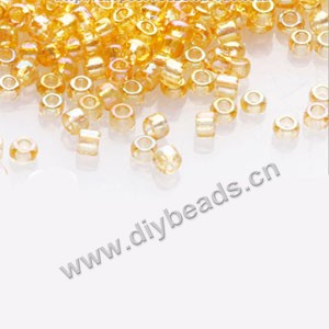 #11 seed beads,glass, yellow,rainbow,irregular round.sold per pkg of 1/2 kilo.
