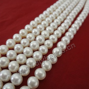 Pearl, cultured freshwater,white,6-7mm nearly round, AA grade. Sold per bag of one strand